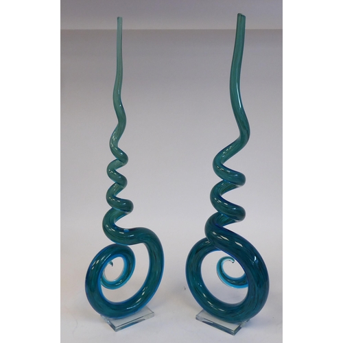 1 - A pair of mid 20thC Murano streaky turquoise coloured glass, spiral sculptures  21