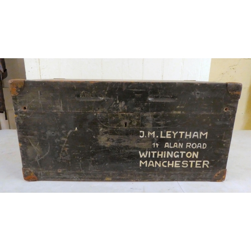 172 - An early/mid 20thC overpainted pine trunk with straight sides and a hinged lid  inscribed 'Majo... 