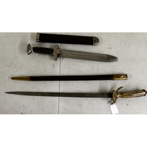 174 - Two dissimilar sheathed edged weapons  the blades 11