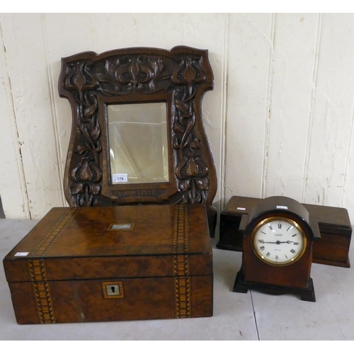 179 - 19thC and later wooden collectables: to include an Art Nouveau period, carved oak framed mirror  20