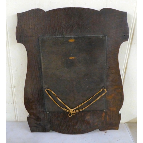 179 - 19thC and later wooden collectables: to include an Art Nouveau period, carved oak framed mirror  20