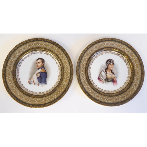 188 - A pair of 19thC Continental porcelain portrait plates, depicting Napoleon and Josephine within extra... 