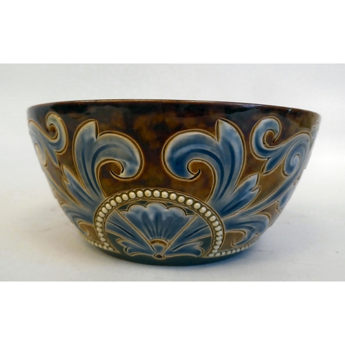 192 - A Doulton Lambeth stoneware bowl, decorated in beadworked and scrolled designs  bears impressed... 