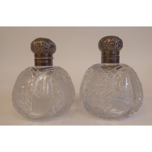 2 - A pair of Victorian hobnail cut glass dressing table bottles with applied silver collars and mushroo... 