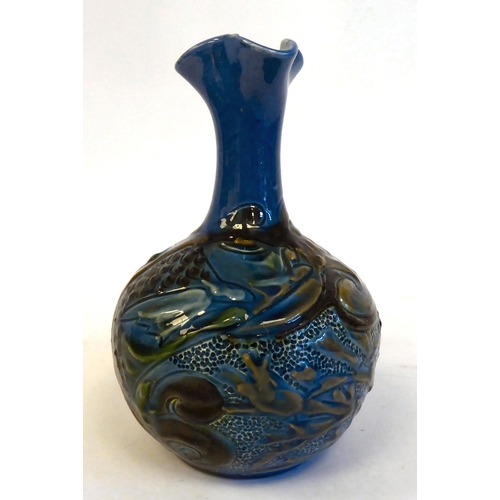 201 - A CH Brannam Barum Ware pottery vase of globular form with a narrow neck and wavy rim, decorated in ... 