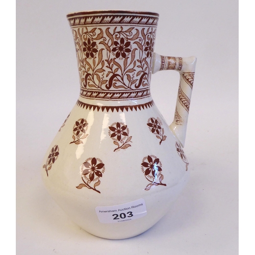 203 - A Mintons cream coloured and brown glazed ewer, traditionally decorated in floral designs  bear... 