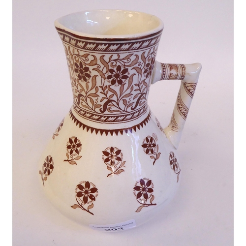 203 - A Mintons cream coloured and brown glazed ewer, traditionally decorated in floral designs  bear... 