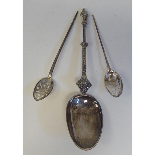 204 - Silver spoons: to include a mid 18thC mote spoon  marks indistinct