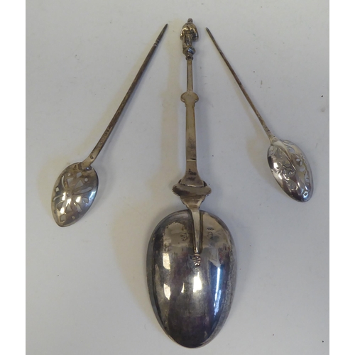 204 - Silver spoons: to include a mid 18thC mote spoon  marks indistinct