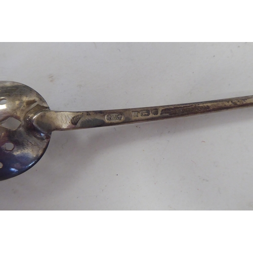 204 - Silver spoons: to include a mid 18thC mote spoon  marks indistinct