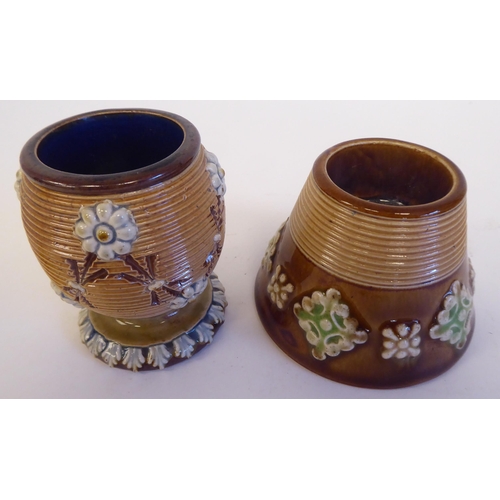 206 - A Royal Doulton and a Doulton Lambeth vesta holder with ribbed, floral ornament  bearing impres... 