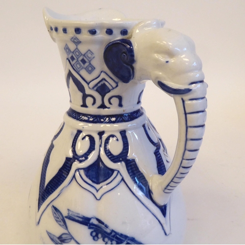 208 - A late 19thC Royal Worcester china water jug of pear design with a moulded elephant's head handle, n... 