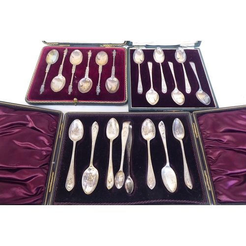 233 - Silver, viz. a set of six silver rattail pattern apostle terminal teaspoons; another set of six, of ... 