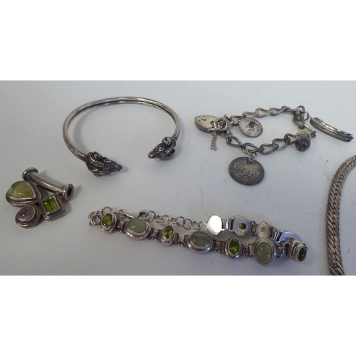 244 - Silver and white metal jewellery: to include a pendant, fashioned as a pig