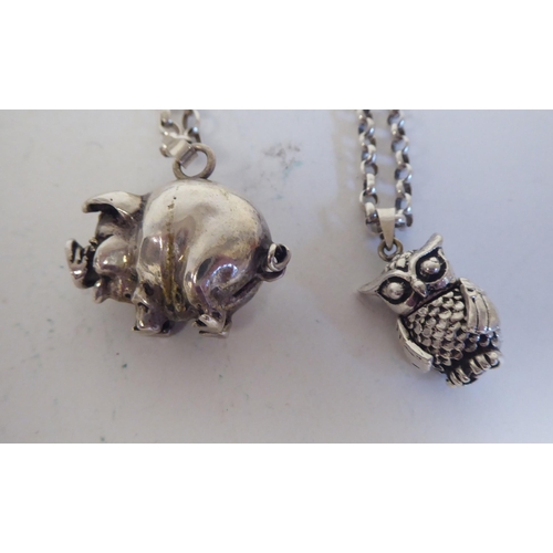 244 - Silver and white metal jewellery: to include a pendant, fashioned as a pig