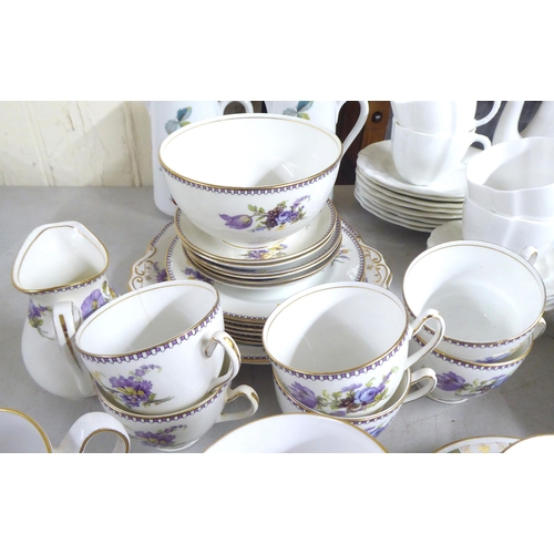 252 - Variously patterned china tableware: to include Royal Crown Derby; Royal Doulton; and Susie Cooper