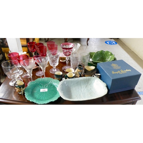 256 - Ceramics and glassware: to include clear and cranberry coloured glass pedestal wines; and Cabbage Le... 