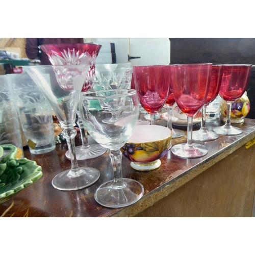 256 - Ceramics and glassware: to include clear and cranberry coloured glass pedestal wines; and Cabbage Le... 