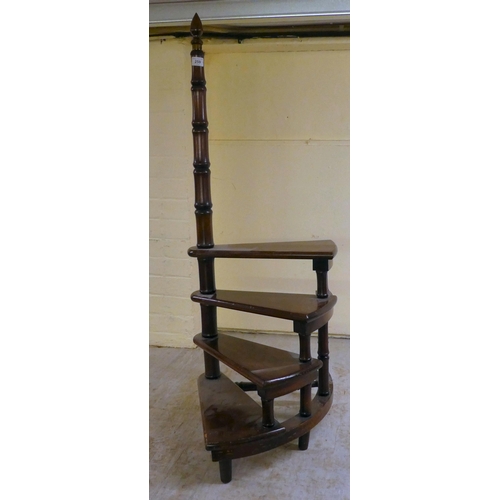 259 - A set of modern mahogany, four tread spiral steps with turned handrail