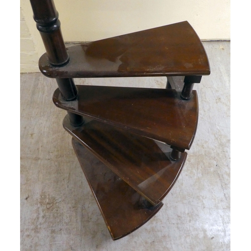 259 - A set of modern mahogany, four tread spiral steps with turned handrail