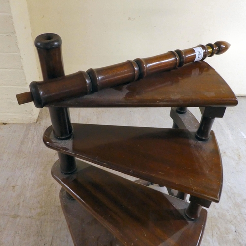 259 - A set of modern mahogany, four tread spiral steps with turned handrail