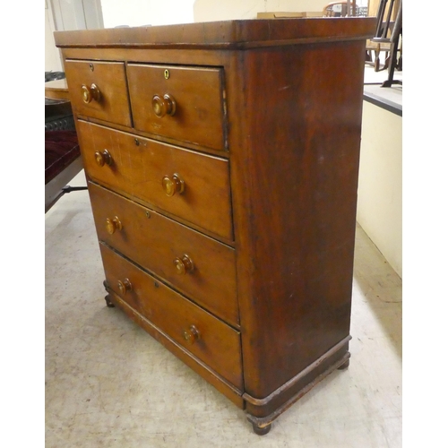 264 - A mid Victorian mahogany five drawer dressing chest, on a plinth and block feet  42