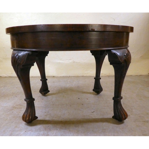 265 - A 1930s Queen Anne inspired crossbanded walnut coffee table, raised on shell carved, fluted legs&nbs... 