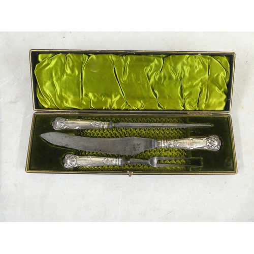 268 - A three piece silver handled carving set  Sheffield marks rubbed  cased