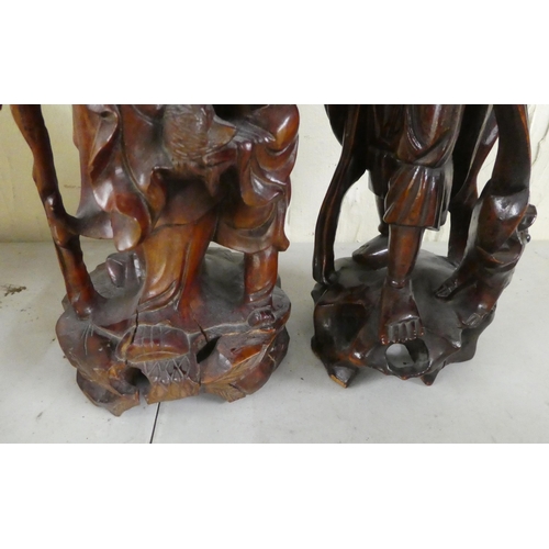 278 - Wooden collectables: to include Chinese hardwood carved figures of elders  11