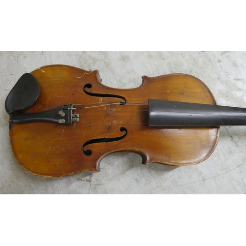 282 - Musical instruments: to include an early 20thC violin, two piece back  14