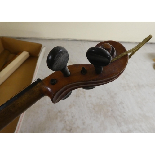 282 - Musical instruments: to include an early 20thC violin, two piece back  14