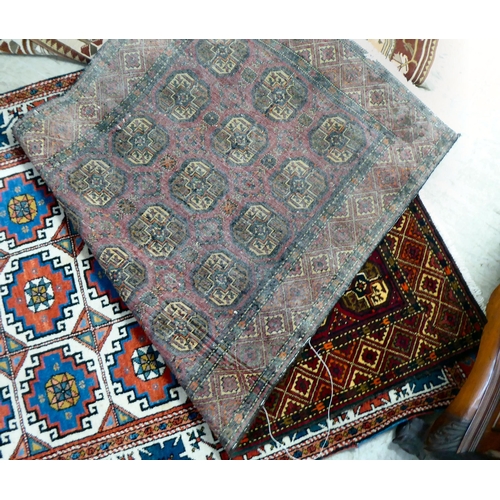 297 - Three dissimilar rugs: to include a Turkish example with repeating box design motifs, on a multi-col... 