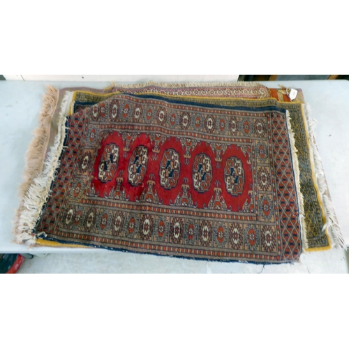 298 - Five dissimilar small rugs