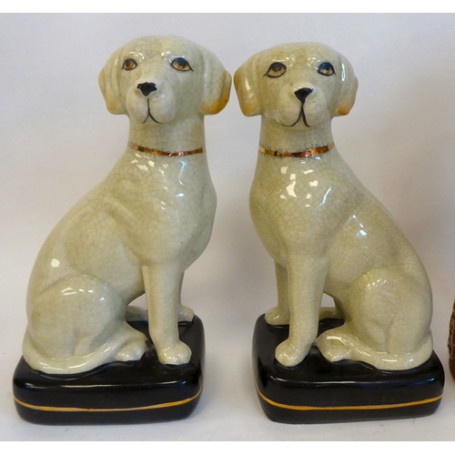 300 - A mixed lot: to include a composition bronze effect model of a seated dog  5