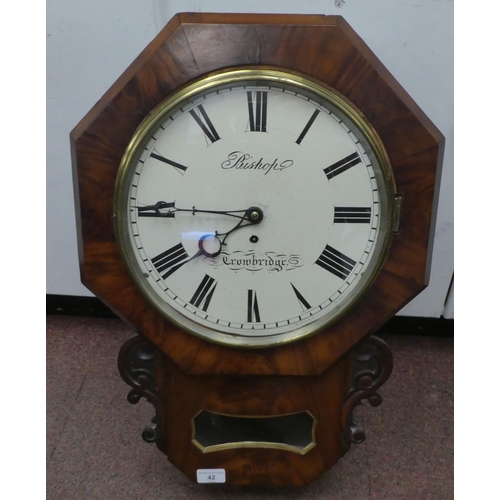 42 - A mid Victorian mahogany cased, drop-dial timepiece of octagonal form with scroll carved flanks and ... 