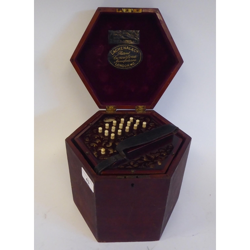 43 - A Lachenal & Co of London, hexagonal cased concertina, in a fitted wooden box