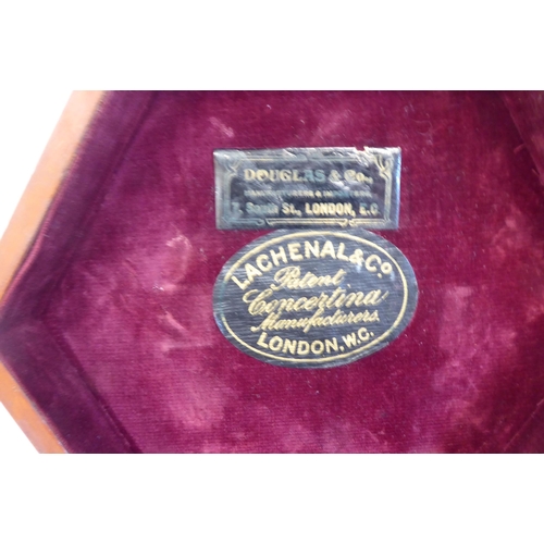 43 - A Lachenal & Co of London, hexagonal cased concertina, in a fitted wooden box