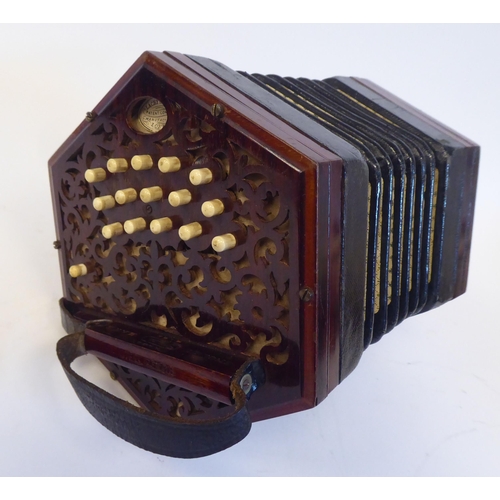 43 - A Lachenal & Co of London, hexagonal cased concertina, in a fitted wooden box