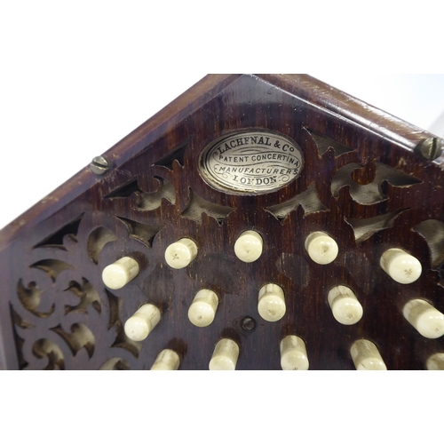 43 - A Lachenal & Co of London, hexagonal cased concertina, in a fitted wooden box