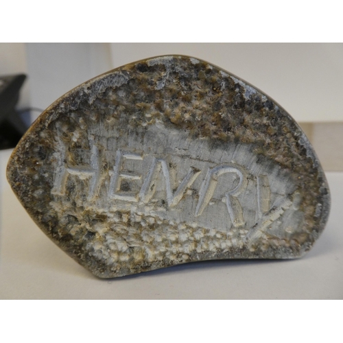 47 - Henry Munyaradzi - a multi-coloured carved stone sculpture, a head  bears an inscribed signature, on... 