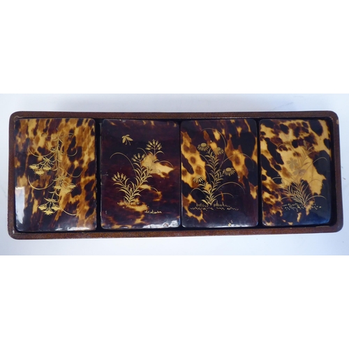 48 - An early 20thC Japanese lacquered, gilded and part tortoiseshell clad gaming box, enclosing four rem... 