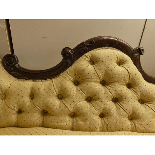 62 - A late Victorian walnut framed chaise longue, button upholstered in beige fabric, raised on cabriole... 