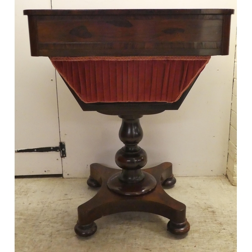 65 - An early Victorian rosewood sewing table with two drawers and a wool basket, raised on a pedestal ba... 