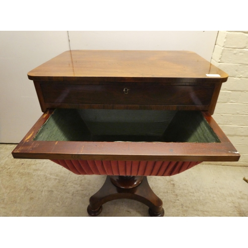 65 - An early Victorian rosewood sewing table with two drawers and a wool basket, raised on a pedestal ba... 