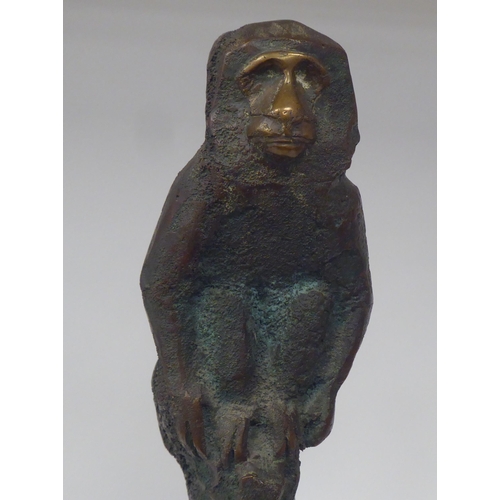 68 - Chris Price - a cast and patinated bronze study of a monkey, seated on a tree stump  bears an inscri... 