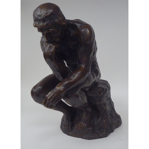 73 - After A Rodin - a cast and patinated bronze figure 'The Thinker'  bears an impressed signature  14