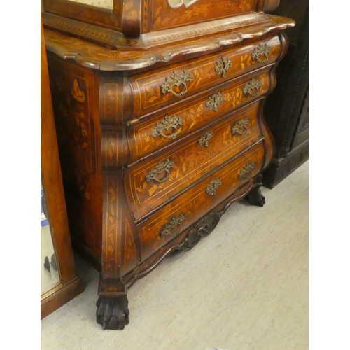 89 - A 19thC, possibly Dutch, floral marquetry, two-part, bombe front chest, surmounted by a carved crest... 