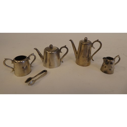 50 - Four items of silver dolls house teaware  comprising a teapot, hotwater pot, sugar basin with tongs ... 