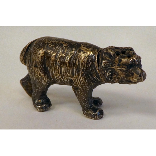 1 - An early 20thC silver miniature brown bear pepper pot  bears an indistinct marks & an import mar... 