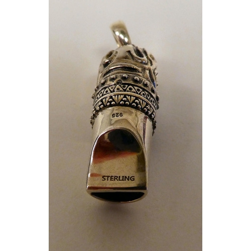 109 - A Sterling silver dog whistle, on a pendant ring 